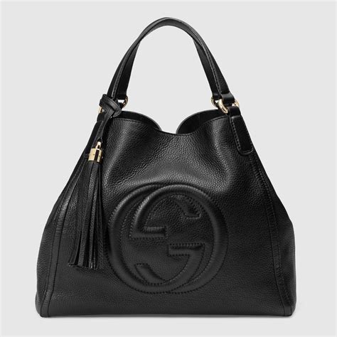 gucci white recluse|Gucci black leather bag.